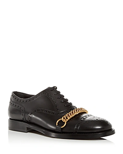 Shop Burberry Men's Lewis Leather Brogue Cap-toe Oxfords In Black