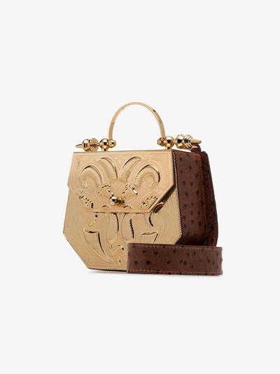 Shop Okhtein Gold Hexagonal Palmette Minaudiere Cross Body Bag
