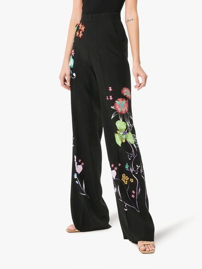 Shop Etro Wide Leg Floral Print Trousers In Black