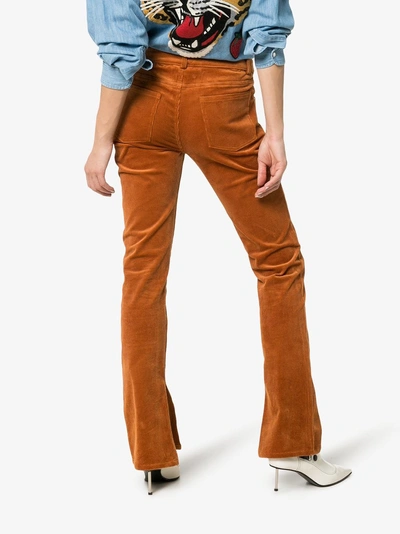 Ganni Ridgewood Slit Hem Corduroy Trousers In Brown | ModeSens