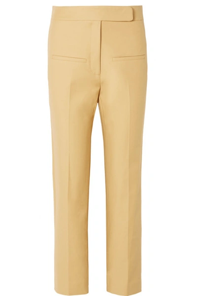 Shop Khaite Coco Cropped Cotton-twill Straight-leg Pants In Sand