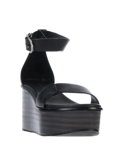 Shop Pomme D'or Sandals In Black