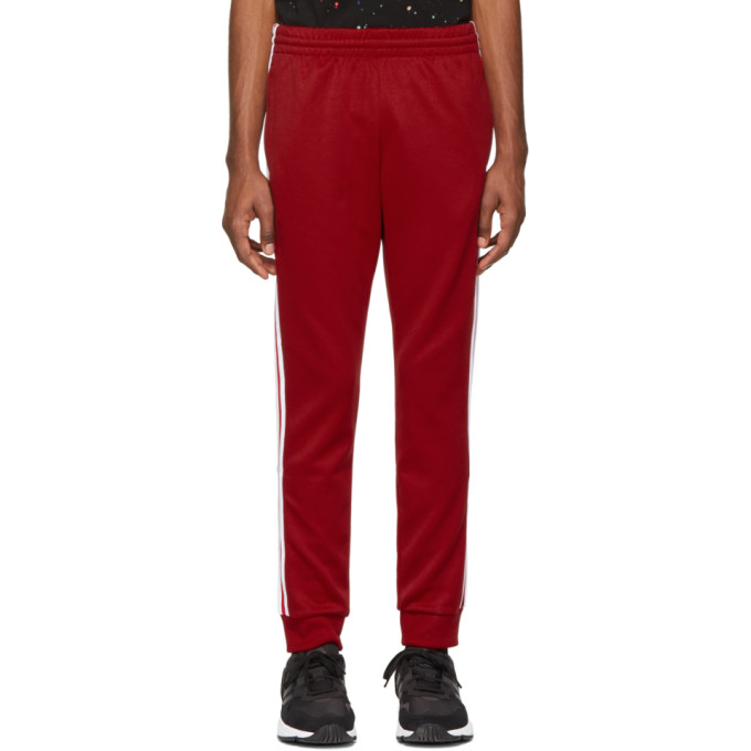 red adidas sst track pants