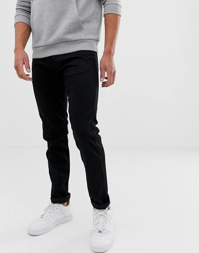 Shop Replay Anbass Stretch Slim Jeans In Black