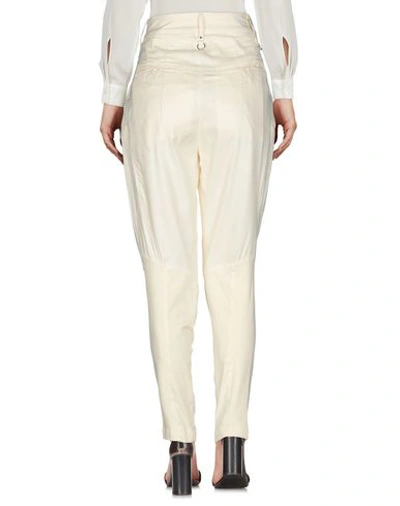 Shop High Pants In Light Yellow