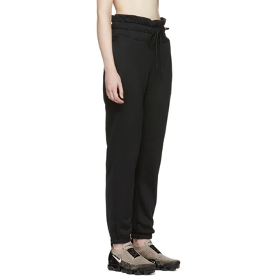 Shop Nike Lab Black Nrg Flc Lounge Pants In Black/black