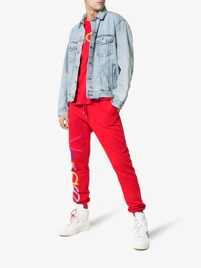 Shop Versace Logo Embroidered Cotton Track Pants In Red