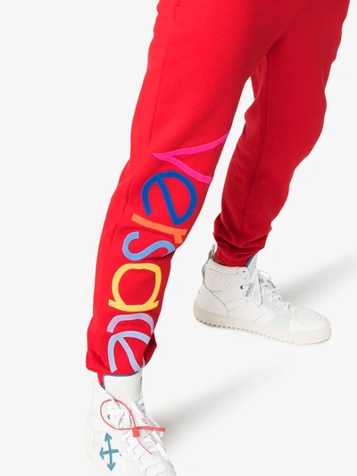 Shop Versace Logo Embroidered Cotton Track Pants In Red
