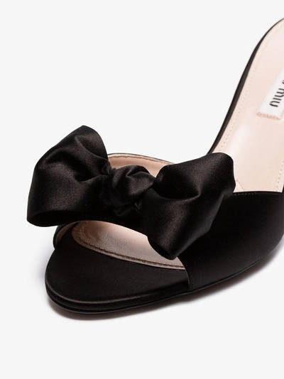 Shop Miu Miu Black 55 Bow Embellished Satin Mules