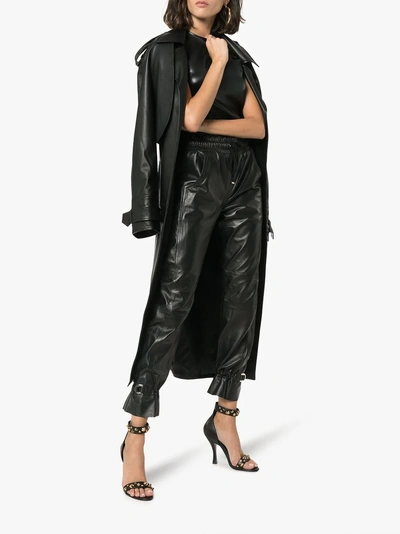 Shop Skiim Gaby High-waisted Leather Track Pants In Black