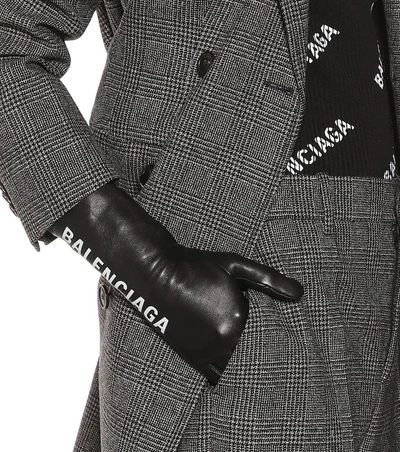 Shop Balenciaga Printed Leather Gloves In Black