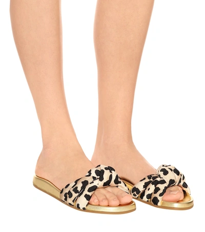 Shop Charlotte Olympia Dylan Knotted Slides In Gold