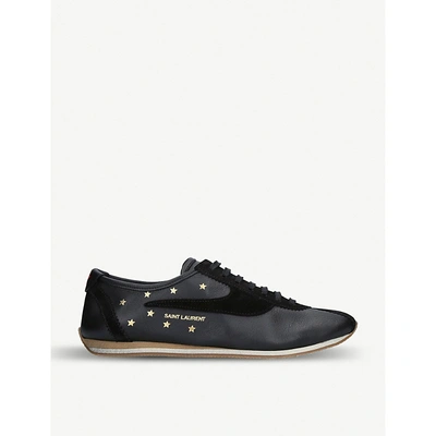 Shop Saint Laurent Jay Star-embossed Leather Trainers In Black