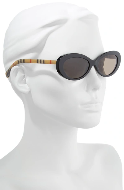 Shop Burberry 54mm Oval Sunglasses - Black Solid