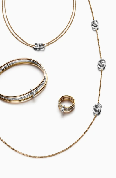 Shop Adore Interlocking Ring Bangle Trio Bracelet In Silver/ Gold/ Rose Gold