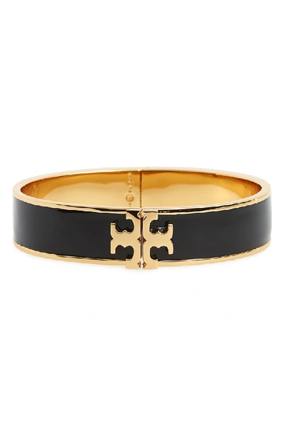 Shop Tory Burch Raised Logo Enamel Hinge Bracelet In Black / Tory Gold