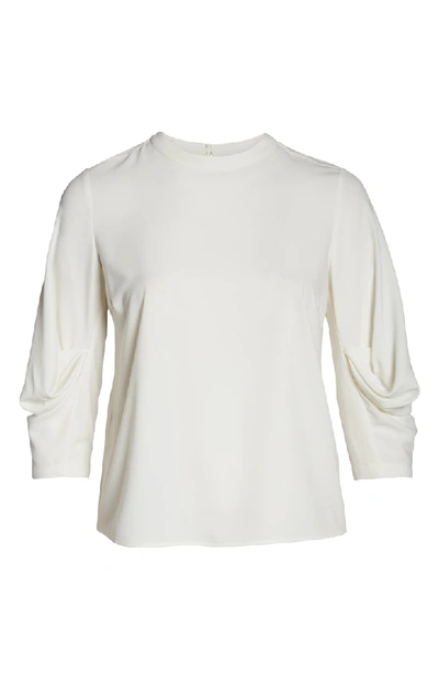 Shop Vince Camuto Draped Sleeve Top In Pearl Ivory