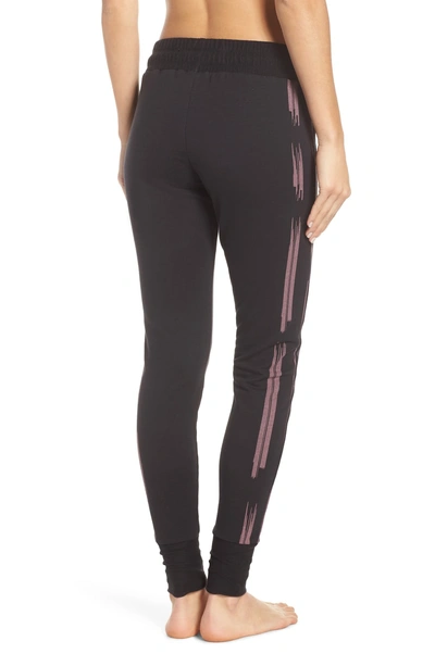 Shop Free People Fp Movement Sunny Skinny Sweat Jogger Pants In Black/ Pink