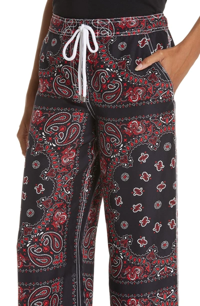 Shop Alexander Wang Bandana Print Trousers In Black/ Red