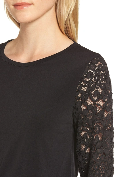 Shop Michael Michael Kors Lace Sleeve Jumpsuit In Black