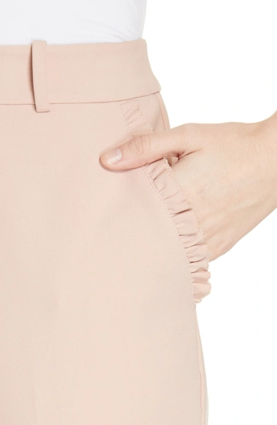 Shop Kate Spade Ruffle Pocket Crop Pants In Pink Opal