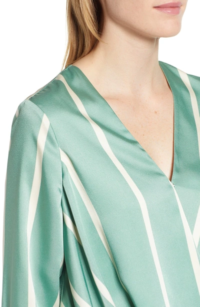 Shop Vince Camuto Stripe Faux Wrap Top In Green Bay