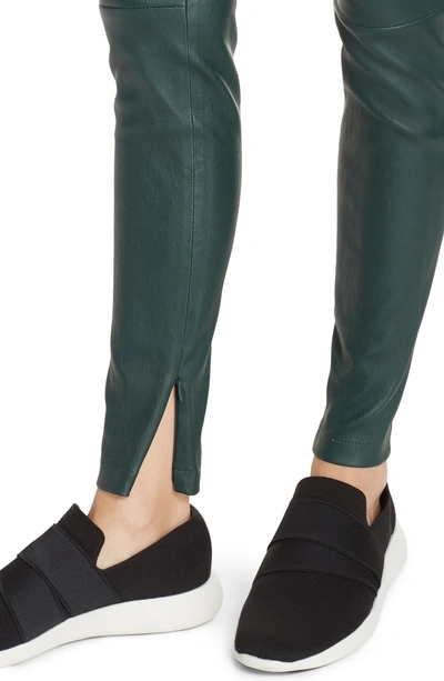 Shop Vince Ankle Zip Leather Leggings In Dark Palm