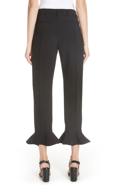 Shop Valentino Ruffle Hem Stretch Wool Trousers In Black