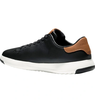 Shop Cole Haan Grandpro Tennis Sneaker In Black/ British Tan