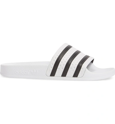 Shop Adidas Originals Adilette Slide Sandal In White / Core Black / White