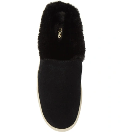 Shop Toms Sunrise Faux Fur Lined Slip-on Sneaker In Black Suede