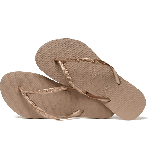 gold rubber flip flops