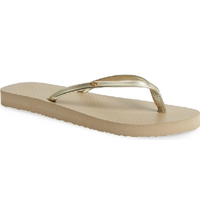 Shop Tory Burch Logo Metallic Flip Flop In Spark Gold/ Light Taupe