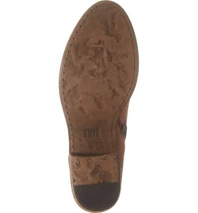 Shop Frye Carson Piping Bootie In Cognac