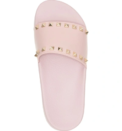 Shop Valentino Rockstud Slide Sandal In Water Rose Pink