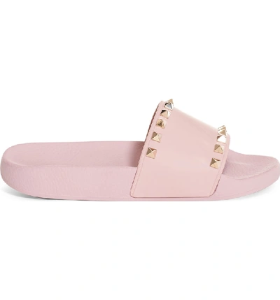 Shop Valentino Rockstud Slide Sandal In Water Rose Pink