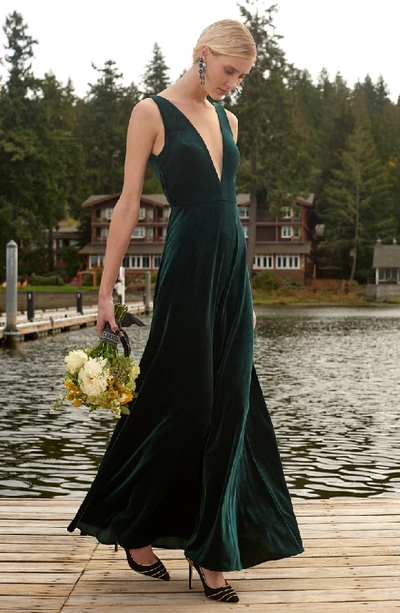 Shop Jenny Yoo Logan Plunging V-neck Velvet Gown In Emerald