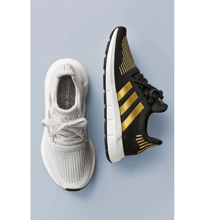 Shop Adidas Originals Swift Run Sneaker In Core Black/ Tech Silver/ White