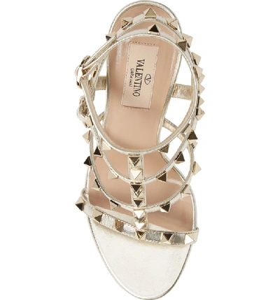 Shop Valentino Rockstud Metallic Ankle Strap Sandal In Platino