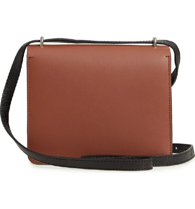 Shop Burberry Small D-ring Leather Crossbody Bag In Tan/ Black