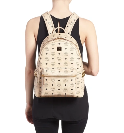 Shop Mcm Medium Stark Side Stud Coated Canvas Backpack In Beige