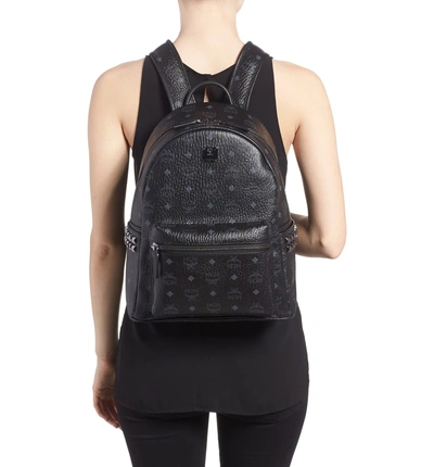 Shop Mcm Medium Stark Side Stud Coated Canvas Backpack In Black