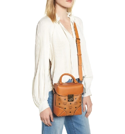 Shop Mcm Small Berlin North/south Crossbody Bag - Brown In Cognac