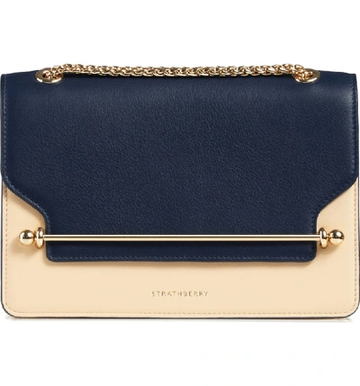 Shop Strathberry Bicolor East/west Leather Crossbody Bag In Navy/ Sand