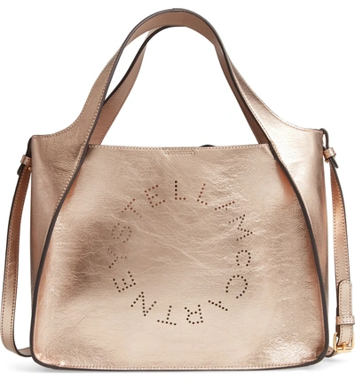 Shop Stella Mccartney Perforated Logo Metallic Faux Leather Satchel - Metallic In Rose Gold