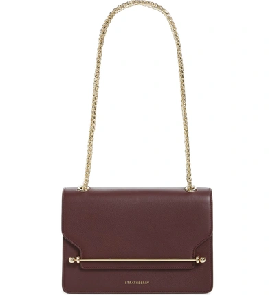 Shop Strathberry East/west Leather Crossbody Bag In Burgundy