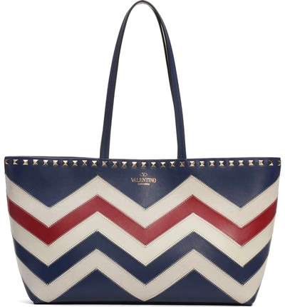 Shop Valentino Small Rockstud Tote - Blue In Pure Blue/ Naturale/ Rosso V