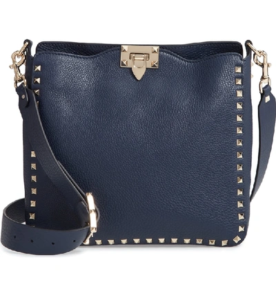Shop Valentino Small Rockstud Leather Hobo - Blue In Marine Blue