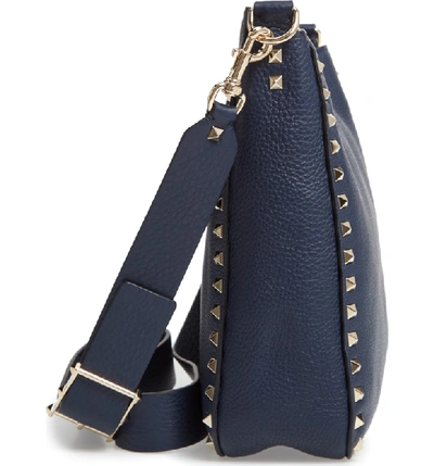 Shop Valentino Small Rockstud Leather Hobo - Blue In Marine Blue