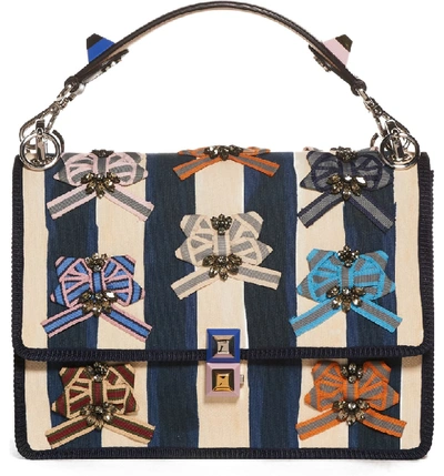 Shop Fendi Kan I Embellished Ribbon Shoulder Bag - Blue In Midnight Blue/camelia